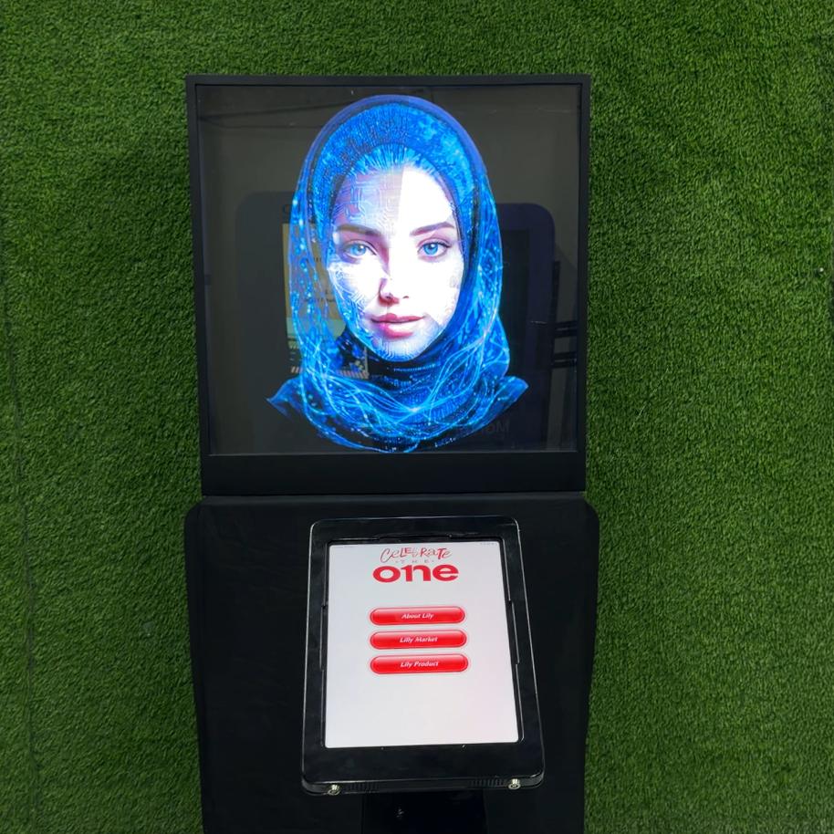 AI kiosk at an event features a digital display of a ai hologram woman in a blue hijab